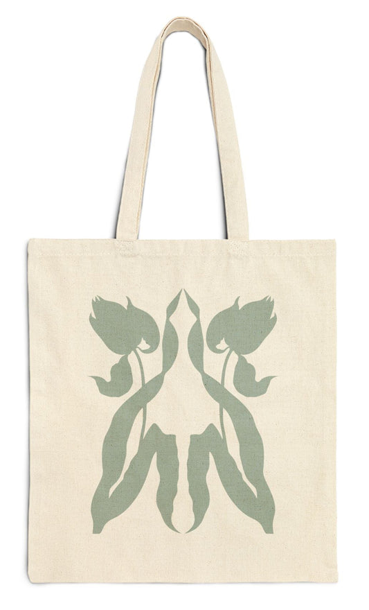 Canvas tote bag with a graphic of two tulips reflecting each other