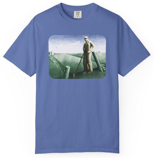 T-shirt with a graphic image of a farmer and his land.
