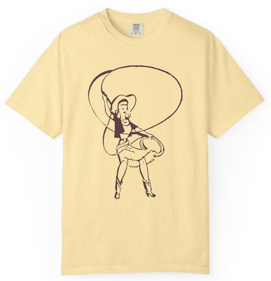 T-shirt with a graphic of a cowgirl roper with a lasso.