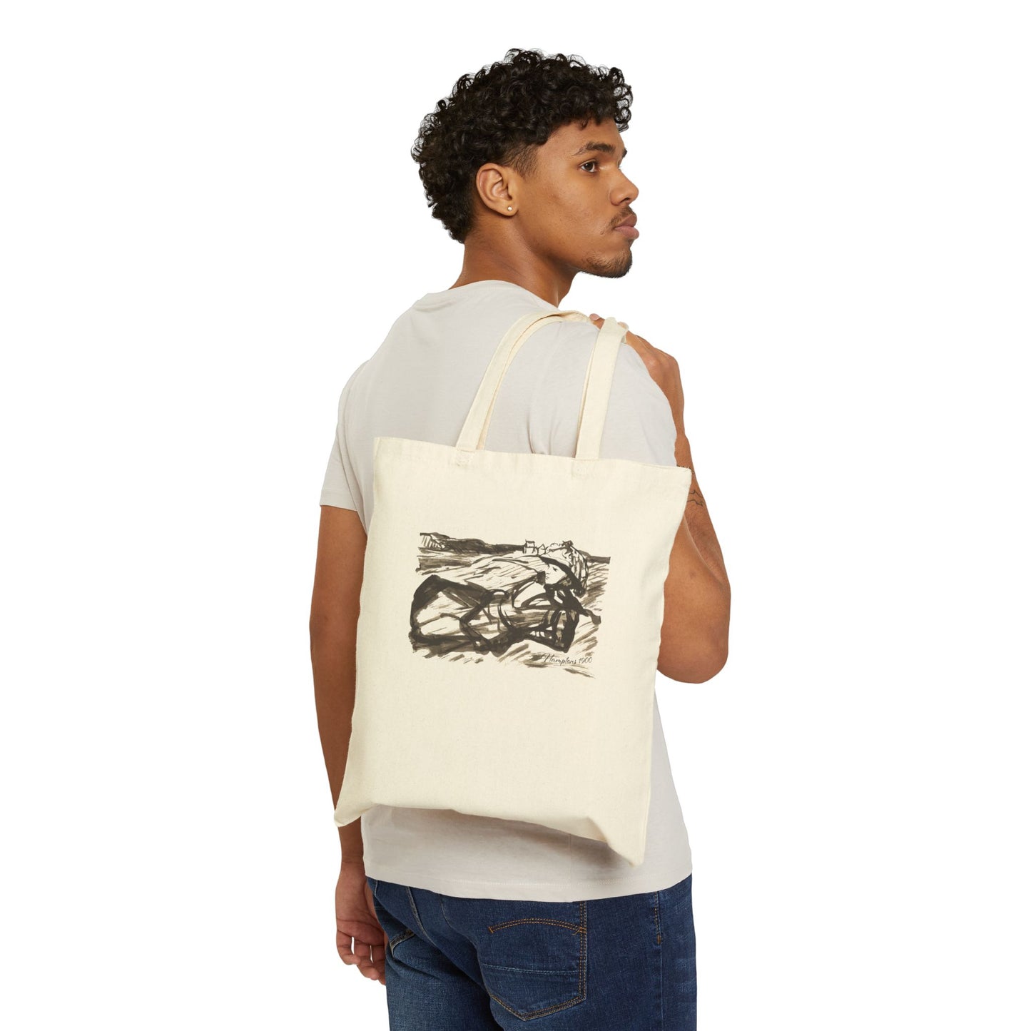 canvas tote bag with graphic of a woman on beach dunes and 'Hamptons 1900' text