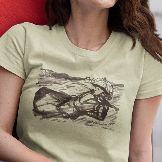 t-shirt with graphic of a woman on beach dunes and 'Hamptons 1900' text
