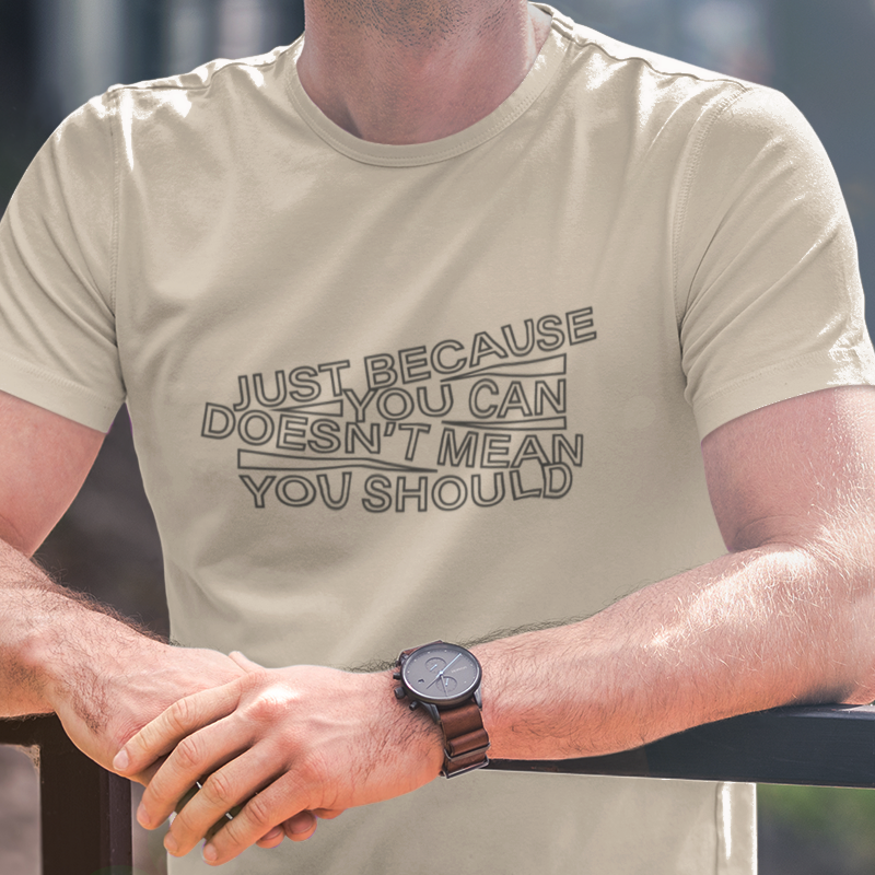 t-shirt with 'just because you can doesn't mean you should' text in an angled design