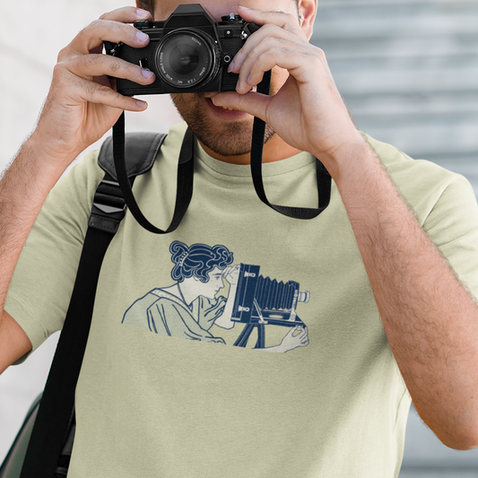 graphic design of a woman photographer using an old style camera