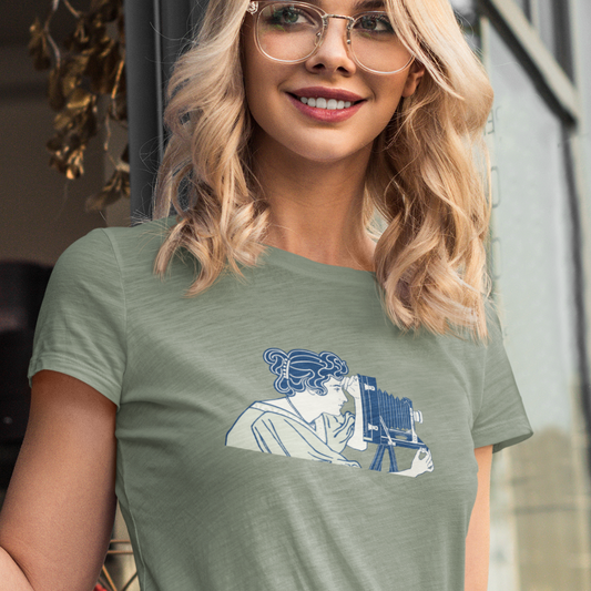 graphic design of a woman photographer using an old style camera
