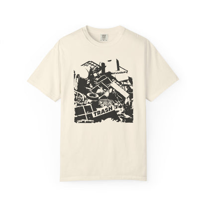 T-shirt with graphic junk pile with text "TRASH" on a piece of junk.