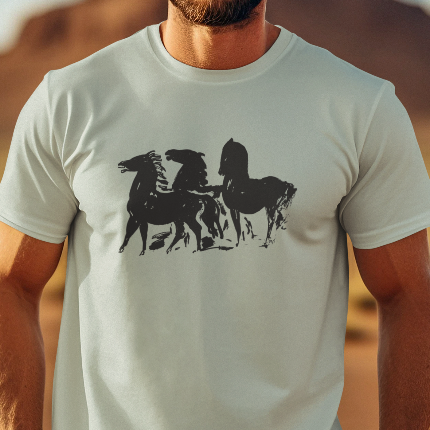 T-shirt with a graphic of 3 black horses
