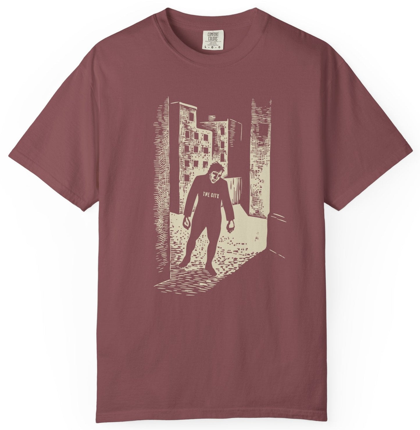 T-shirt with a graphic image of a man in a city.