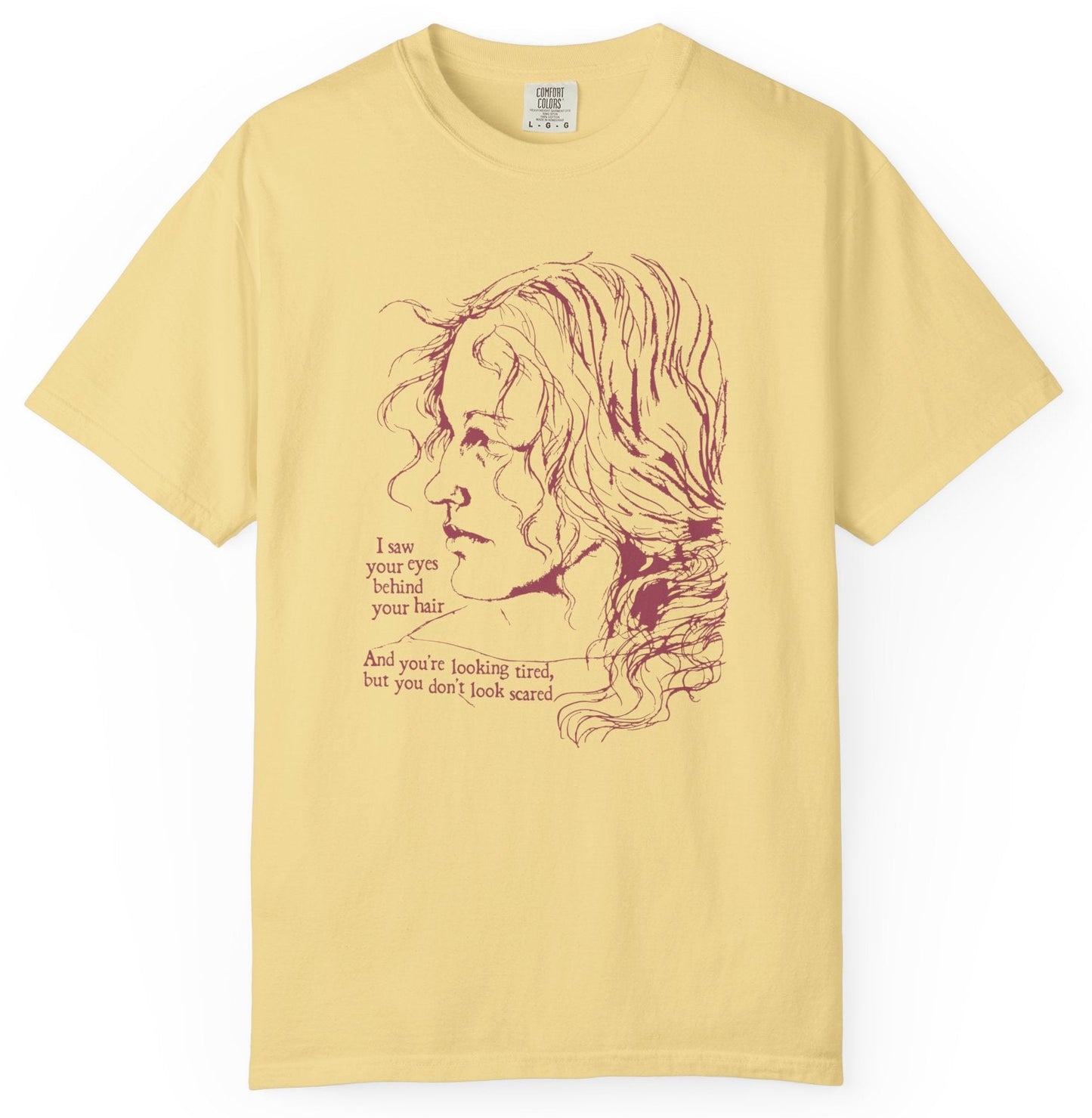T-shirt with graphic of a serious woman and text of Brandi Carlile lyrics from her song 'The Joke'