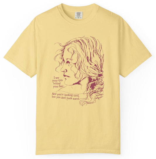 T-shirt with graphic of a serious woman and text of Brandi Carlile lyrics from her song 'The Joke'