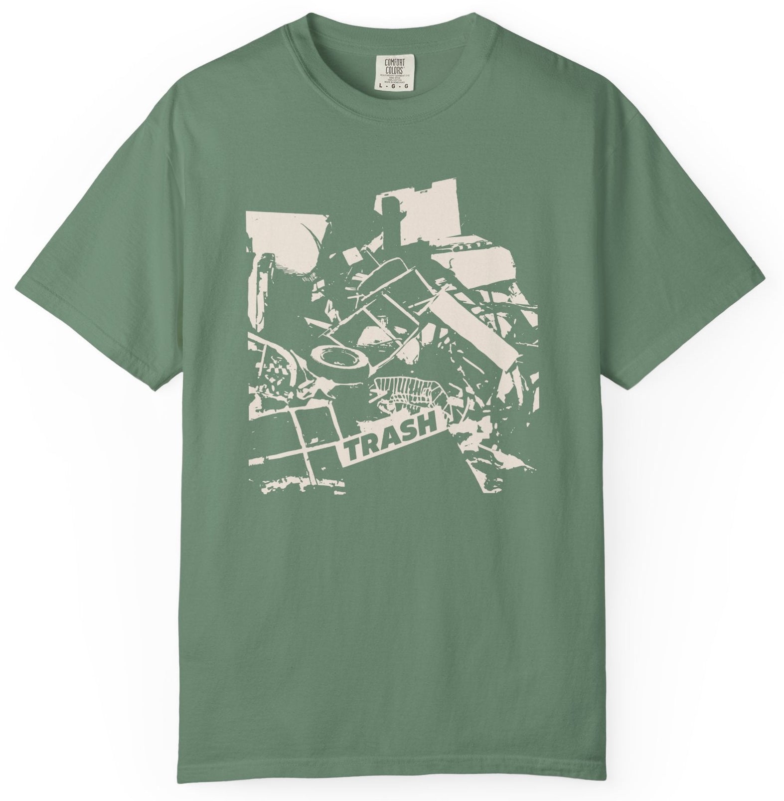 T-shirt with graphic junk pile with text "TRASH" on a piece of junk.