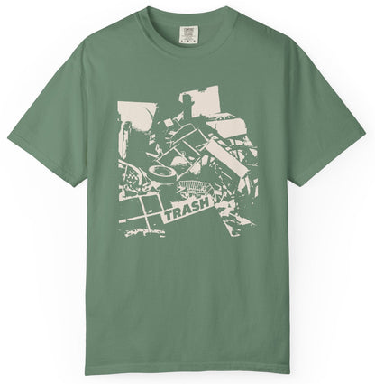 T-shirt with graphic junk pile with text "TRASH" on a piece of junk.