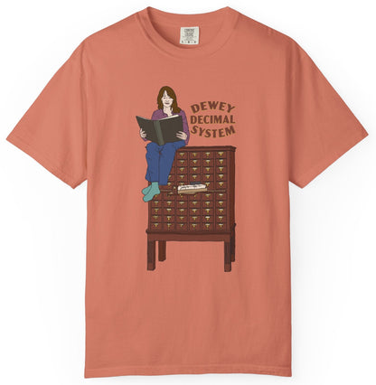 Dewey Decimal System t-shirt with graphic of woman sitting on a card catalog