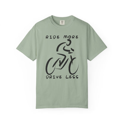T-shirt with "Ride More Drive Less" text and minimalist cyclist graphic.