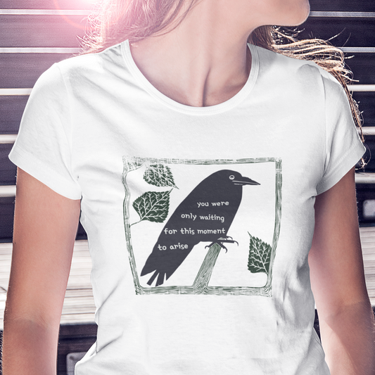 T-shirt with graphic of a black bird on a perch with Beatles lyrics text on it's body.