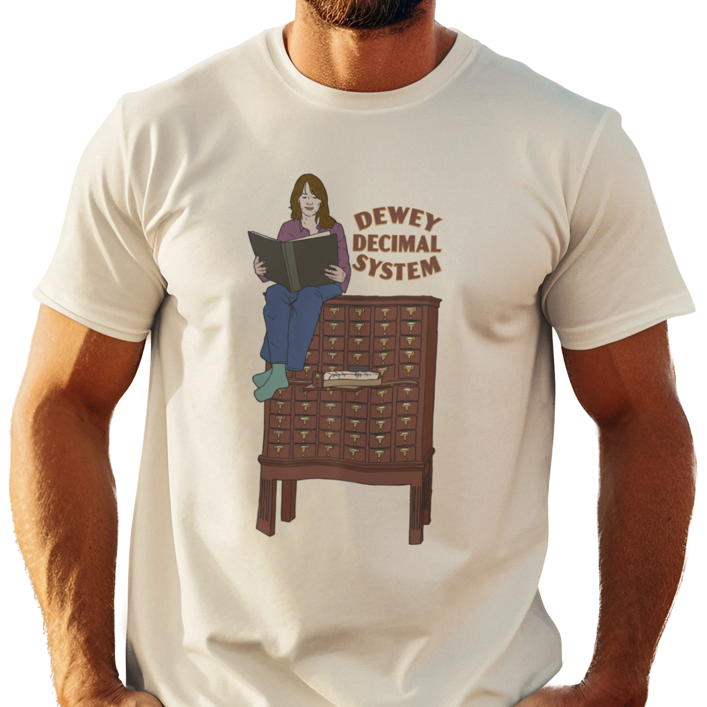 Dewey Decimal System t-shirt with graphic of woman sitting on a card catalog