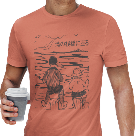 T-shirt with graphic of two boys facing the water with Japanese text