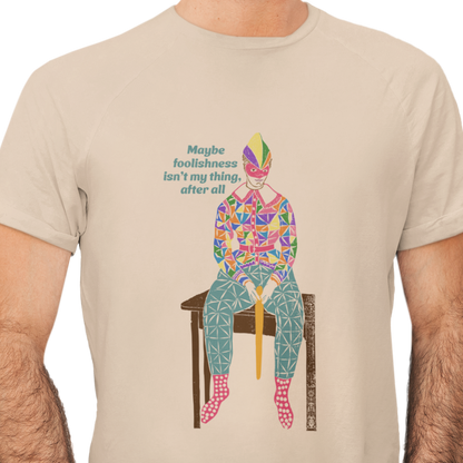T-shirt with text and a graphic of a clownish character.