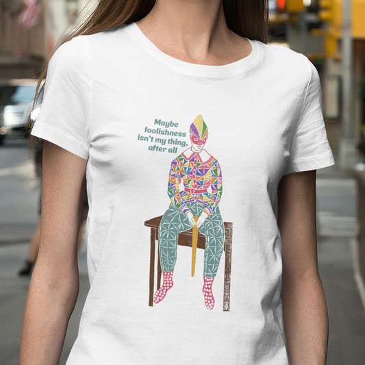 T-shirt with text and a graphic of a clownish character.
