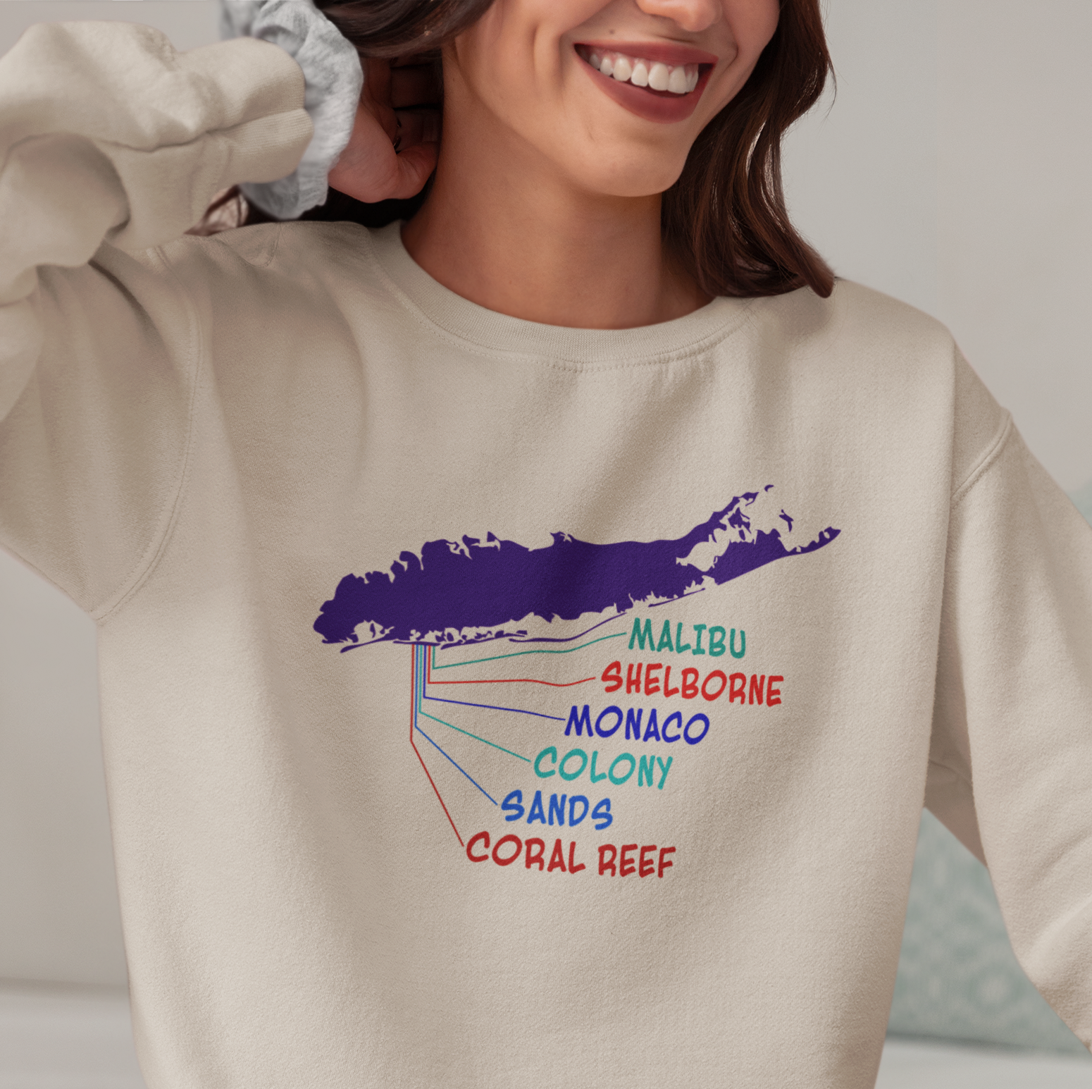 Sweatshirt with a map of Long Island graphic and a colorful list of the old Lido Beach clubs text.