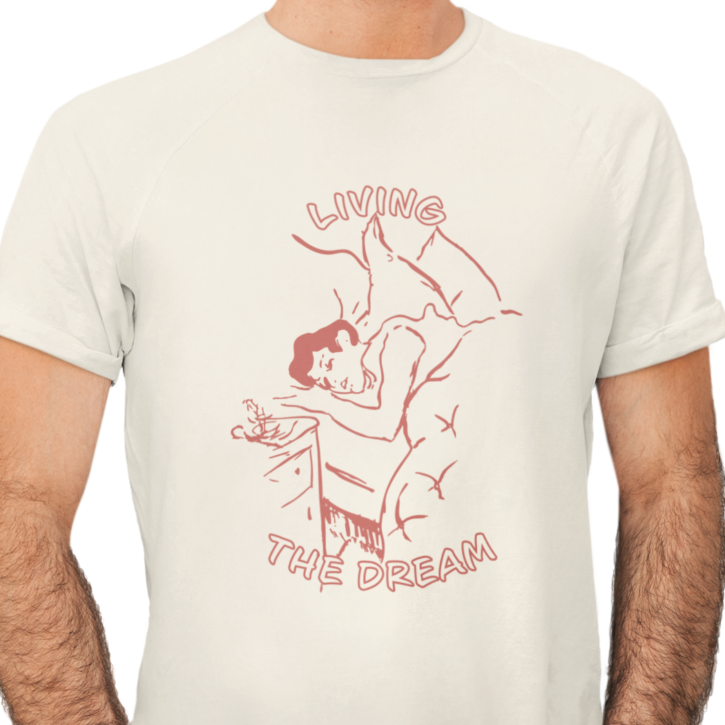 Beige t-shirt with red graphic and 'Living the Dream' text on a white background