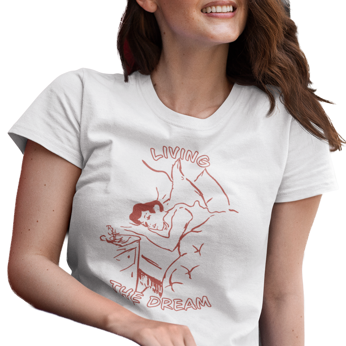 Woman wearing a white t-shirt with a red graphic and text 'Living the Dream'.