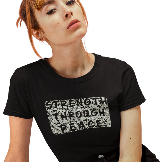 T-shirt with a green floral graphic and 'Strength Through Peace' text.