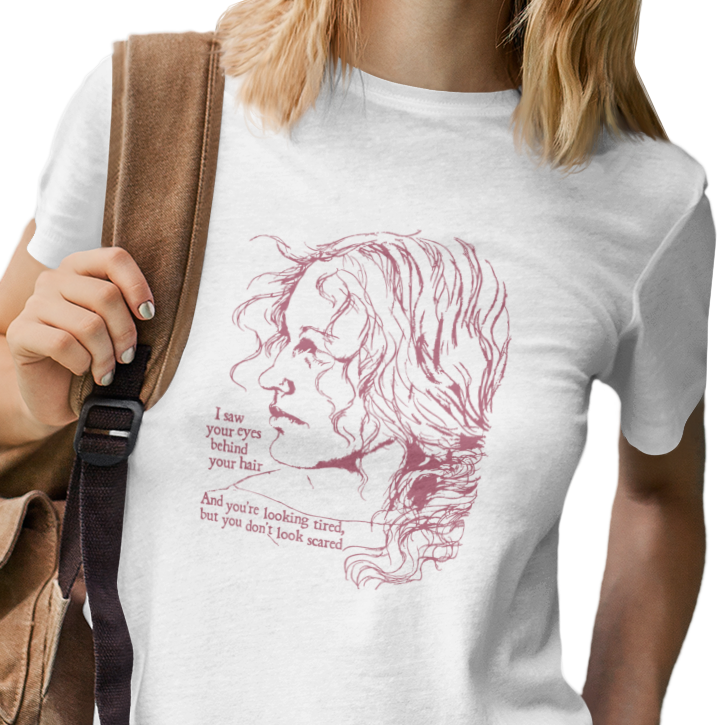 T-shirt with graphic of a serious woman and text of Brandi Carlile lyrics from her song 'The Joke'